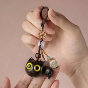 152b8f25558fb55151a34b8fbbdd85ab Ebony car keychain cat pendant